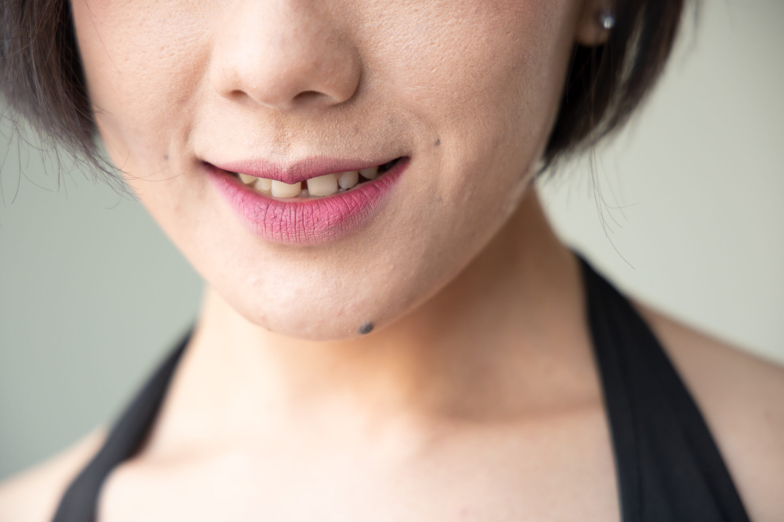 woman with gap teeth or diastema, oral care or tooth care concept